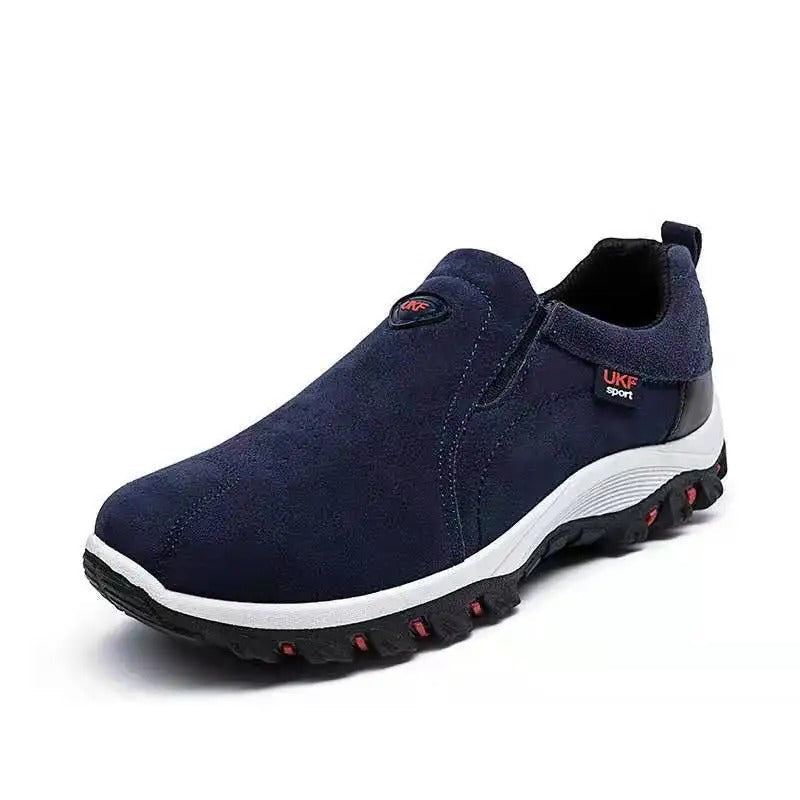 Men's gray orthopedic slip-on shoes with anatomical support and cushioned ergonomic sole
