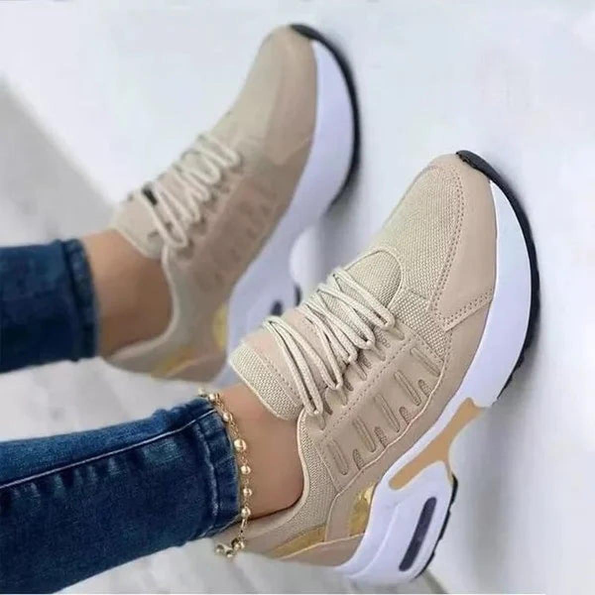 Women's wide-fit grey mesh training sneakers with cushioned sole and breathable lightweight design