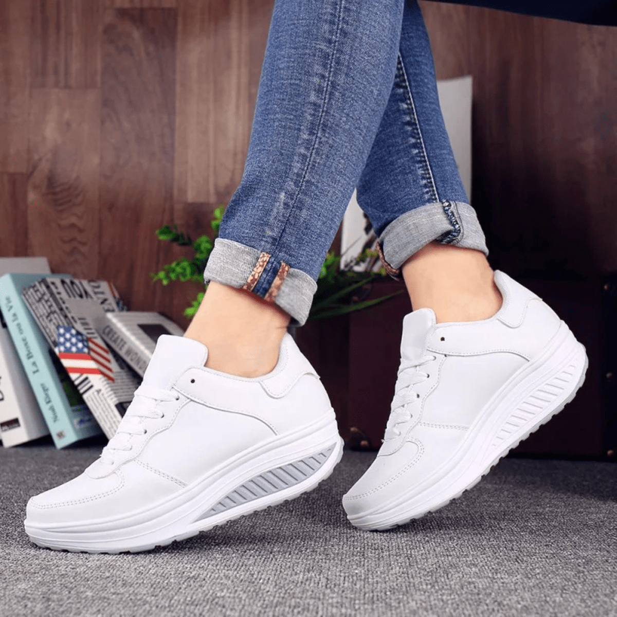 Women's black leather platform sneakers minimalist design with contrasting white cushioned sole