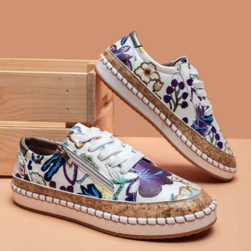 Cali orthopedic sneakers with cushioned orthotic sole, side zip closure, and supportive everyday fit