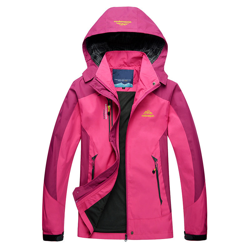Women's navy blue waterproof hiking shell jacket with removable hood and stand collar for all-weather trails