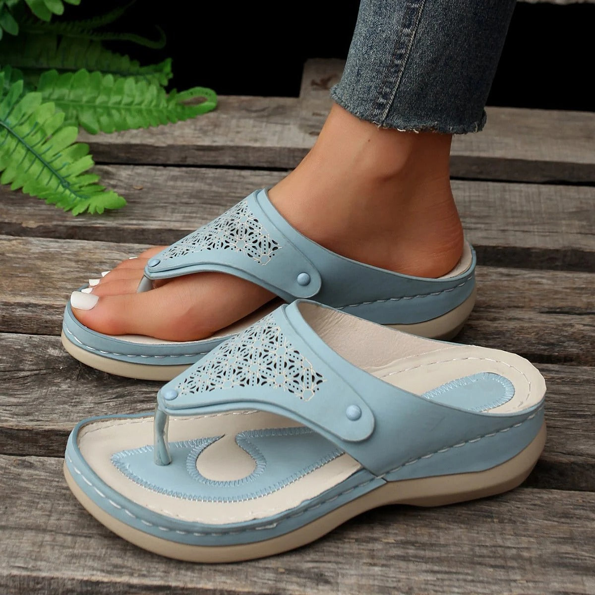 Beige outdoor support sandals with contoured sole, multi-point straps, and open-toe breathable design