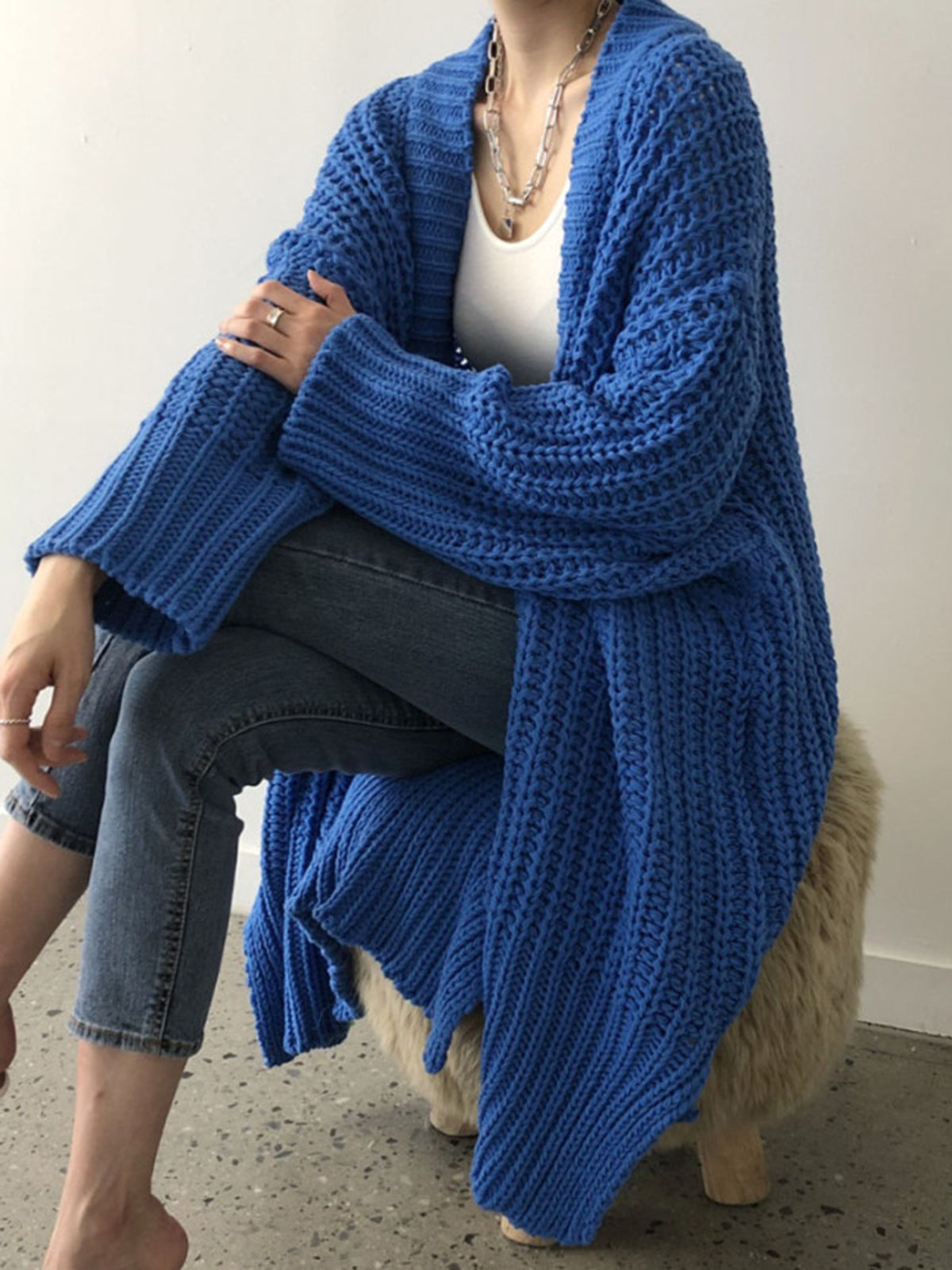 Women's oversized open-front split knit cardigan with relaxed silhouette and cozy texture