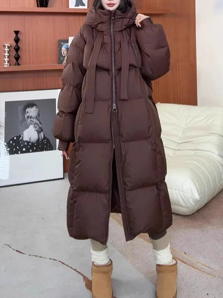 Women's oversized down jacket black puffer coat with plush insulation and relaxed silhouette