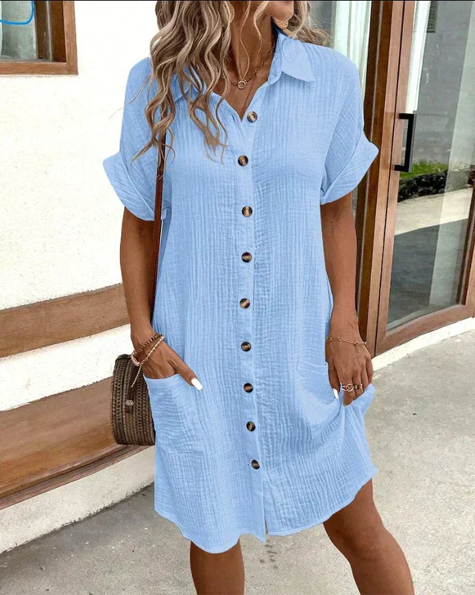 Women's oversized polo dress in neutral tones, relaxed fit with classic collar for work and leisure