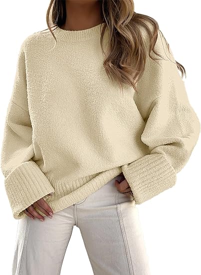 Women's oversized cream crew neck sweater with relaxed fit, cozy knit texture for casual winter wear