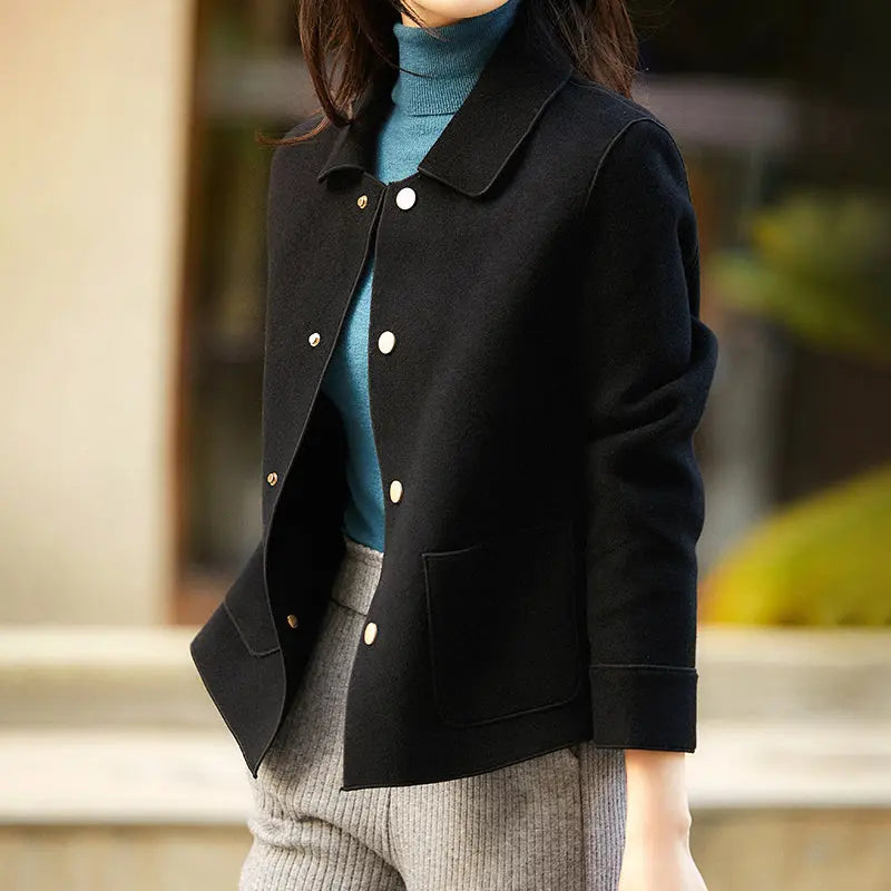 Women's oversized short wool coat in relaxed draped fit, breathable synthetic fabric elegant fall layer