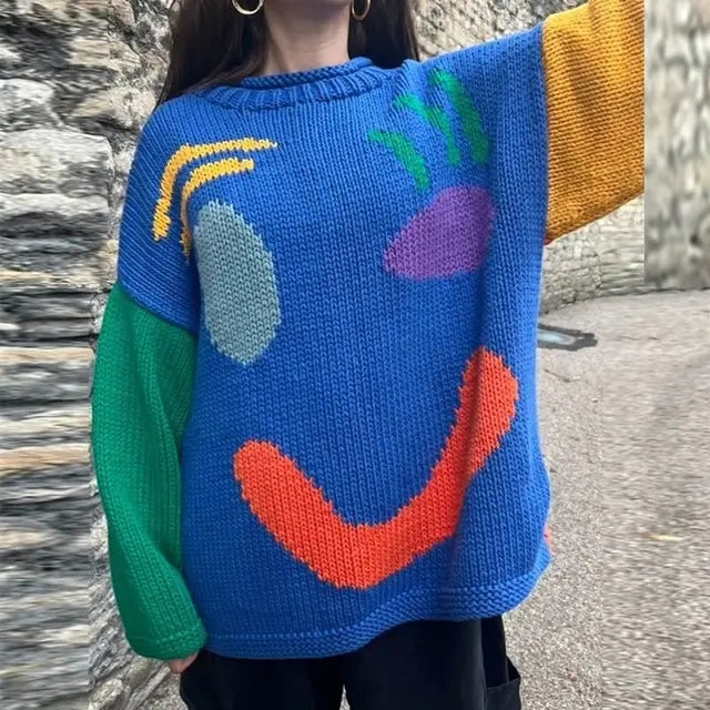 Women's oversized knit cardigan with playful smiley face design, loose relaxed fit for cozy layering