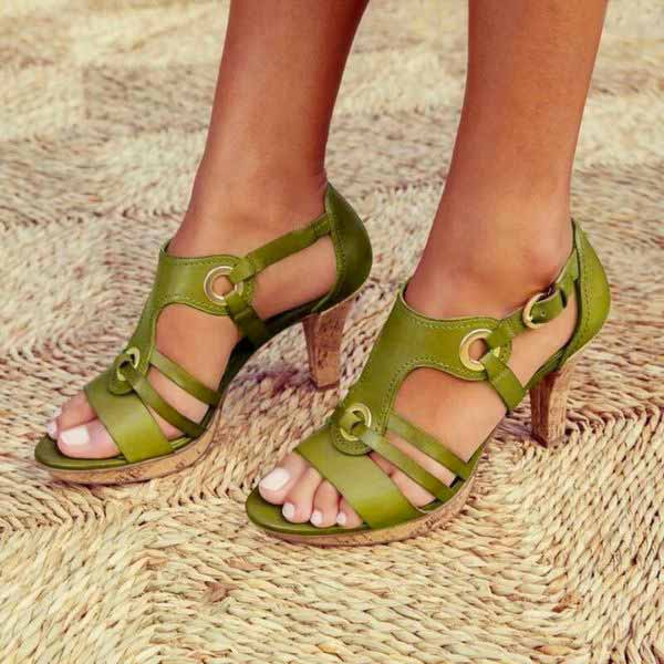 Women's elegant strappy high heel sandals in neutral tone, slender strap design for evening occasions
