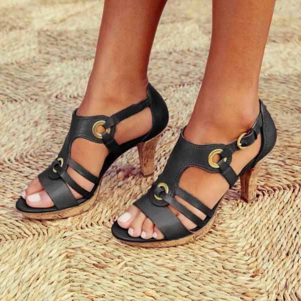 Women's elegant strappy high heel sandals in neutral tone with delicate slender straps for evening occasions