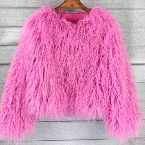 Women's bold winter coat voluminous silhouette chic oversized cut confident city style