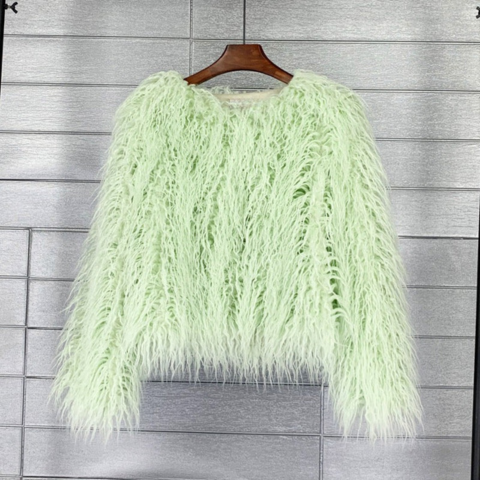 Women's bold winter coat oversized silhouette chic city style confident trendy jacket