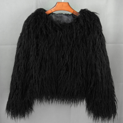 Women's bold winter coat oversized silhouette chic city style confident voluminous jacket