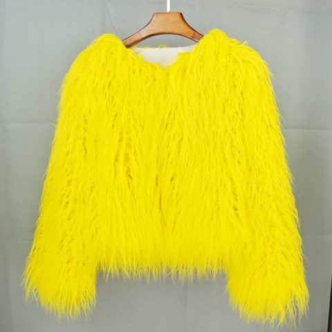 Bold black women's oversized winter coat with voluminous silhouette for chic city style