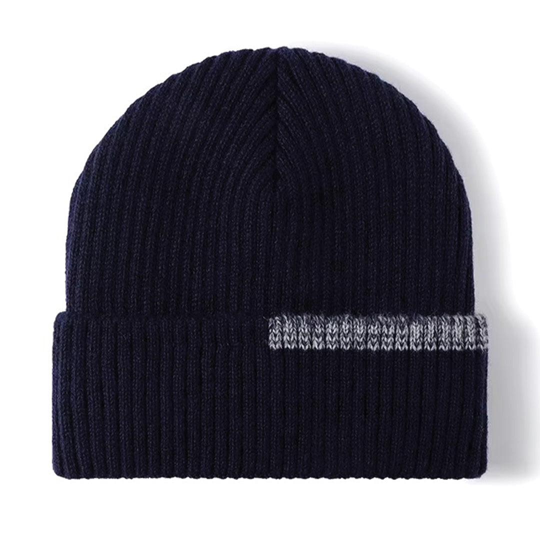 Ribbed beanie with multi-layer padding in neutral tone, structured urban winter style for cold weather