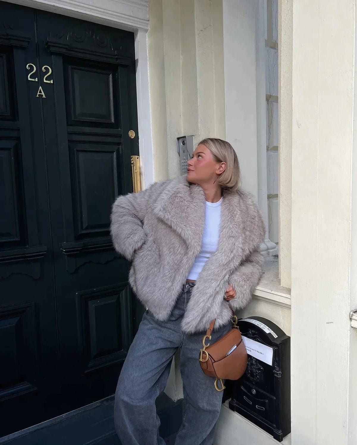 Women's slim fit faux fur winter coat in beige and white with soft luxury lining