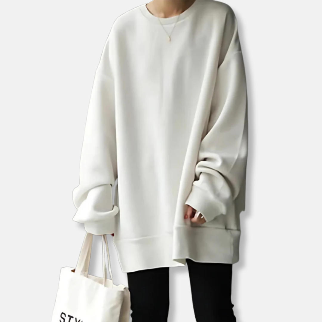 Women's soft knit oversized tunic-length sweatshirt in neutral tones for effortless casual layering