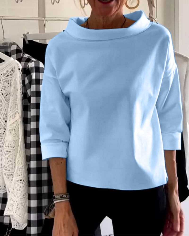 Women's loose fit casual top with wide collar and three-quarter sleeves for everyday comfort