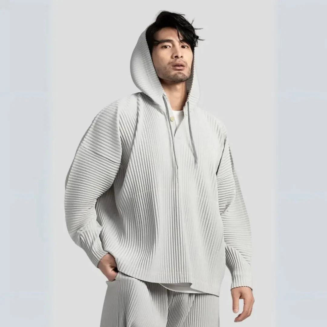 Palmer loose fit pleated hoodie in neutral tones, relaxed unisex silhouette with distinctive pleated texture