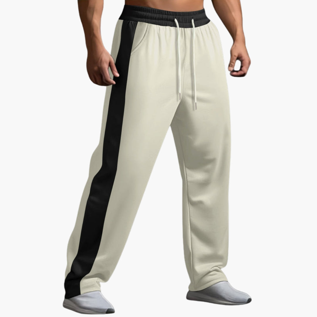Men's black jogging pants with contrasting side stripes, straight fit, elastic drawstring waistband