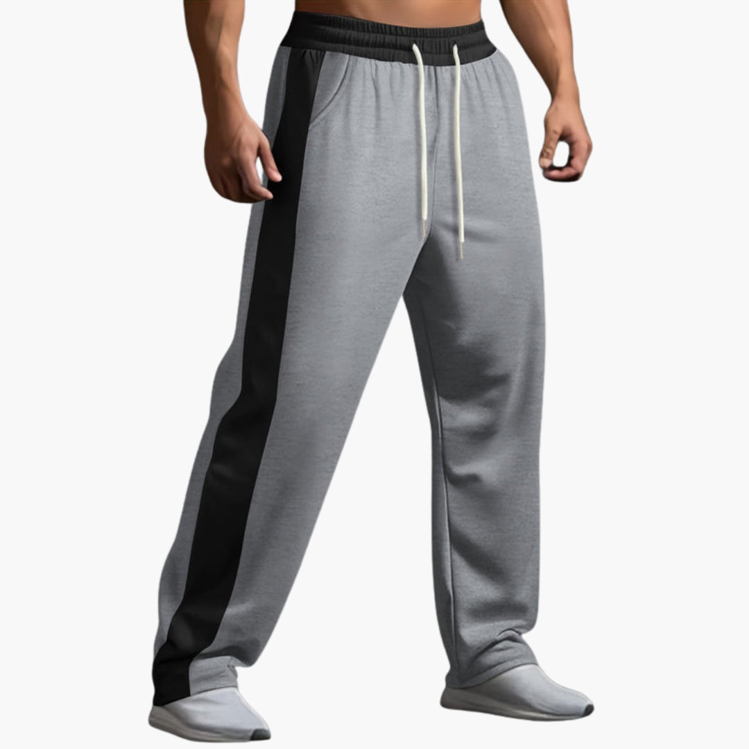Men's gray jogging pants with contrasting side stripes, straight fit, elastic drawstring waistband for active wear