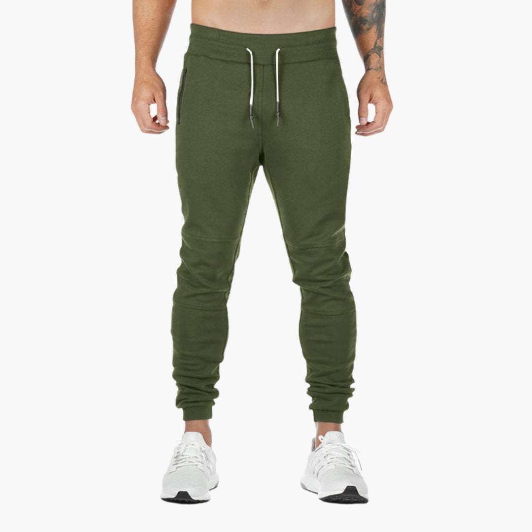 Men's tapered athletic joggers with elastic drawstring waist and zippered pockets for active wear