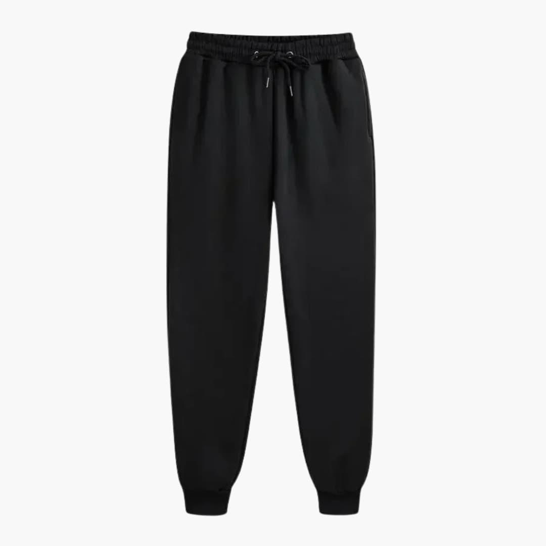 Unisex loose-fit jogging pants with adjustable drawstring waist, solid fabric, minimalist casual style