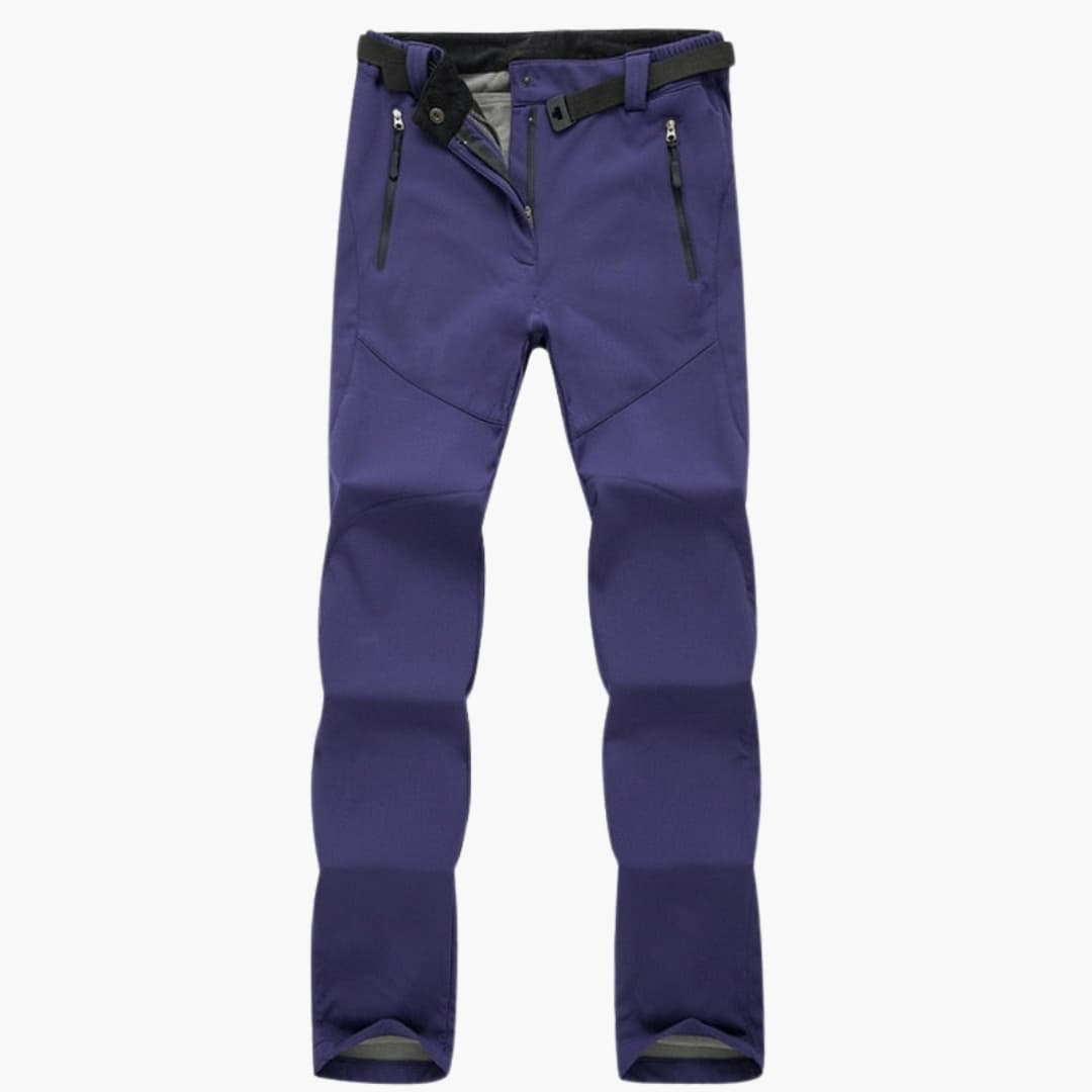 Women's hiking pants with elastic cuffs and zippered pockets, trail-ready fit for all-day comfort
