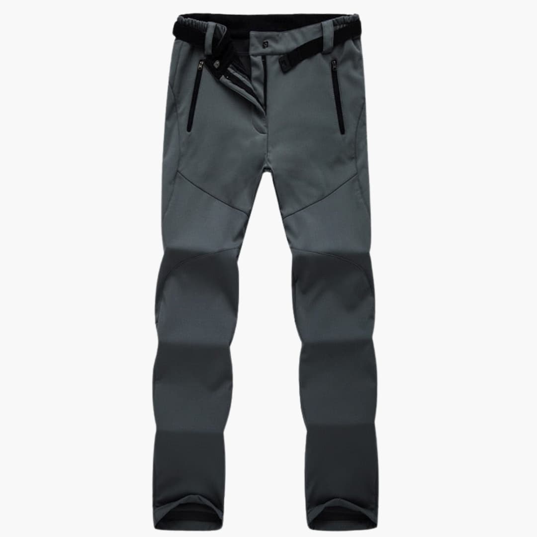 Women's hiking pants with elastic cuffs and zippered pockets, trail-ready fit for all-day comfort