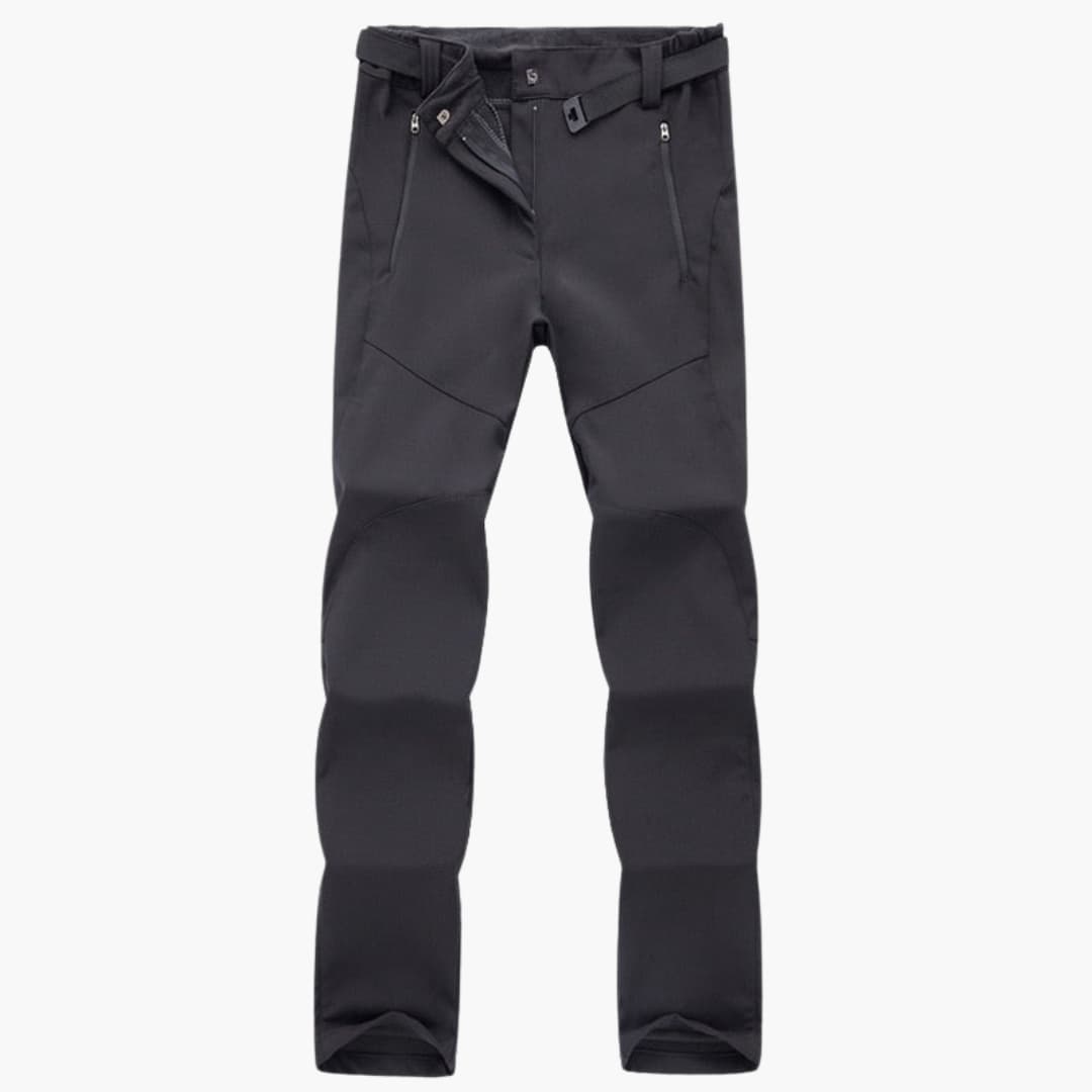 Women's hiking pants with elastic cuffs and zippered pockets, trail-ready fit for all-day outdoor comfort