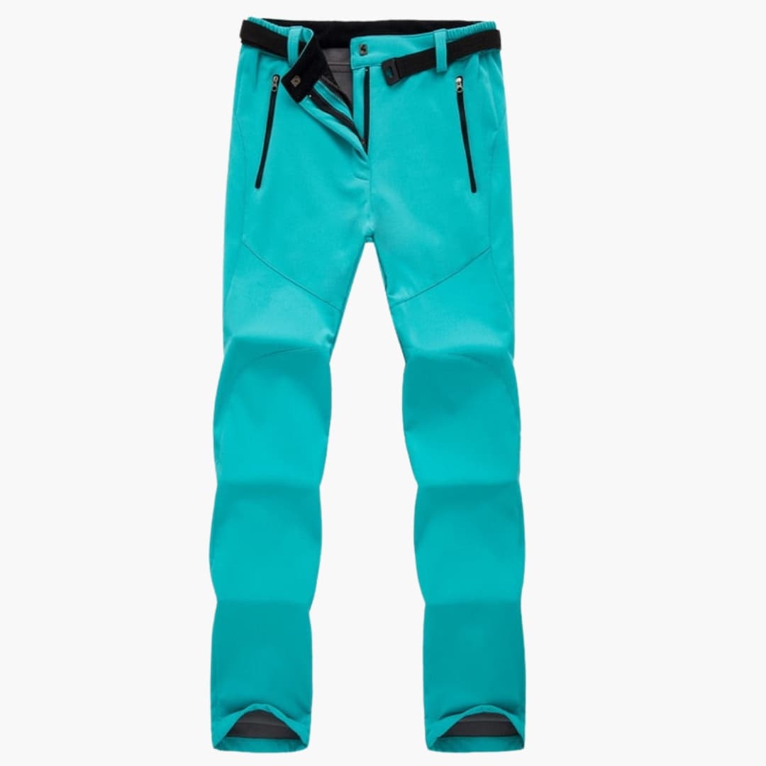 Women's hiking pants with elastic cuffs and zippered pockets, trail-ready fit for all-day comfort