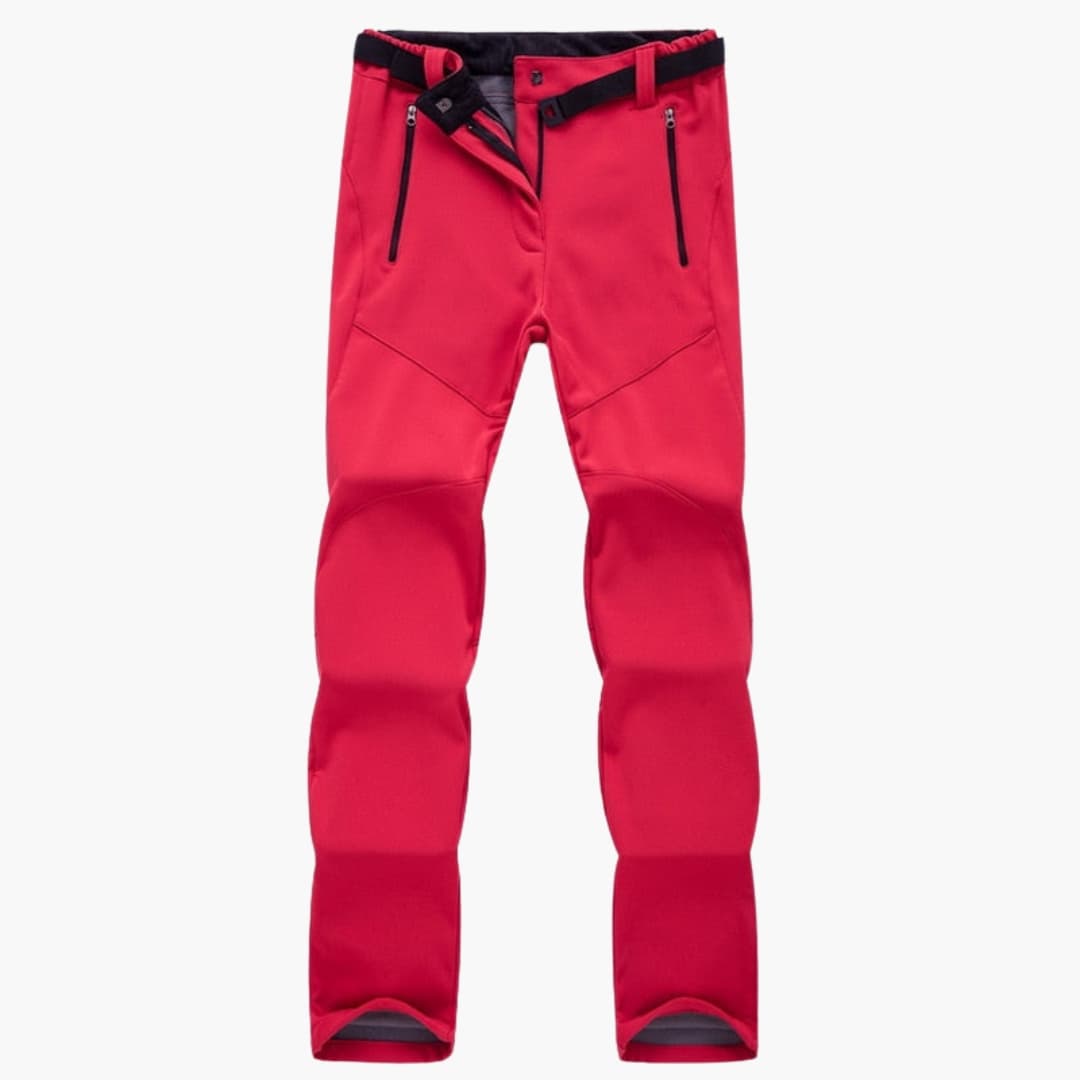 Women's hiking pants with elastic cuffs and zippered pockets, trail-ready fit for all-day comfort