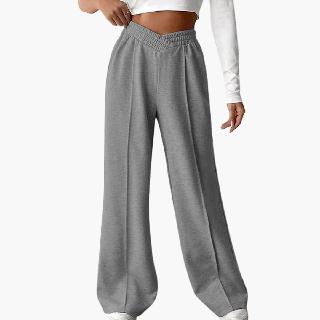 Women's wide leg sports pants with elastic waistband, side pockets, relaxed active fit