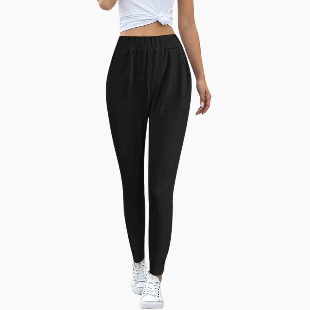 Women's elastic waist pull-on sports pants with side pockets, clean silhouette for active daily wear