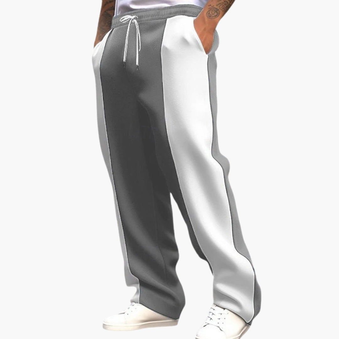 Men's black striped straight-leg athletic pants with elastic waistband, drawstring, and side pockets