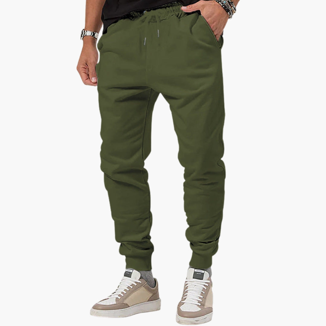 Men's tapered joggers with elastic drawstring waist, side pockets, and slim cuffed ankles