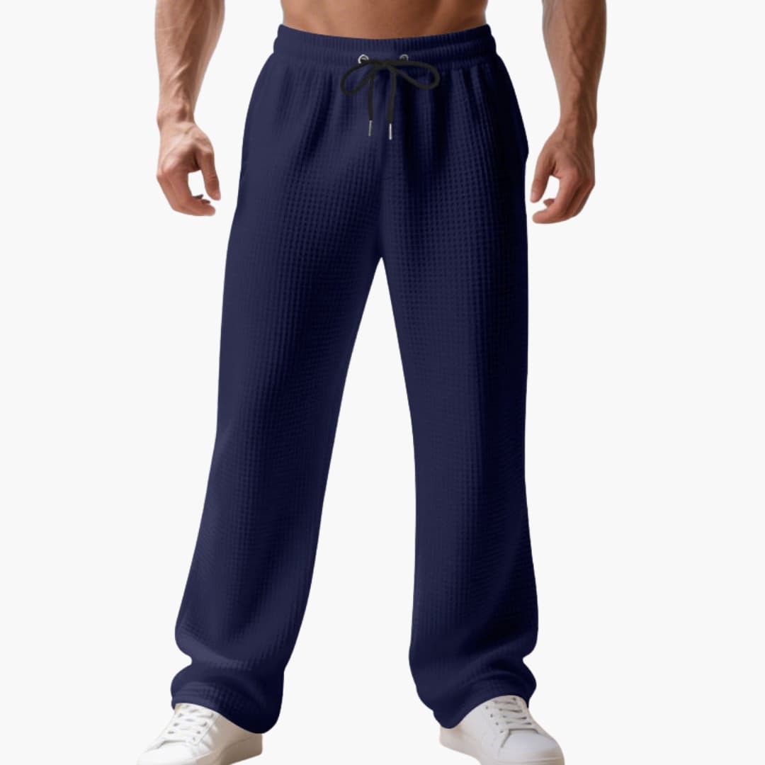 Men's athletic straight-leg pants with elastic waistband and adjustable drawstring, versatile active wear