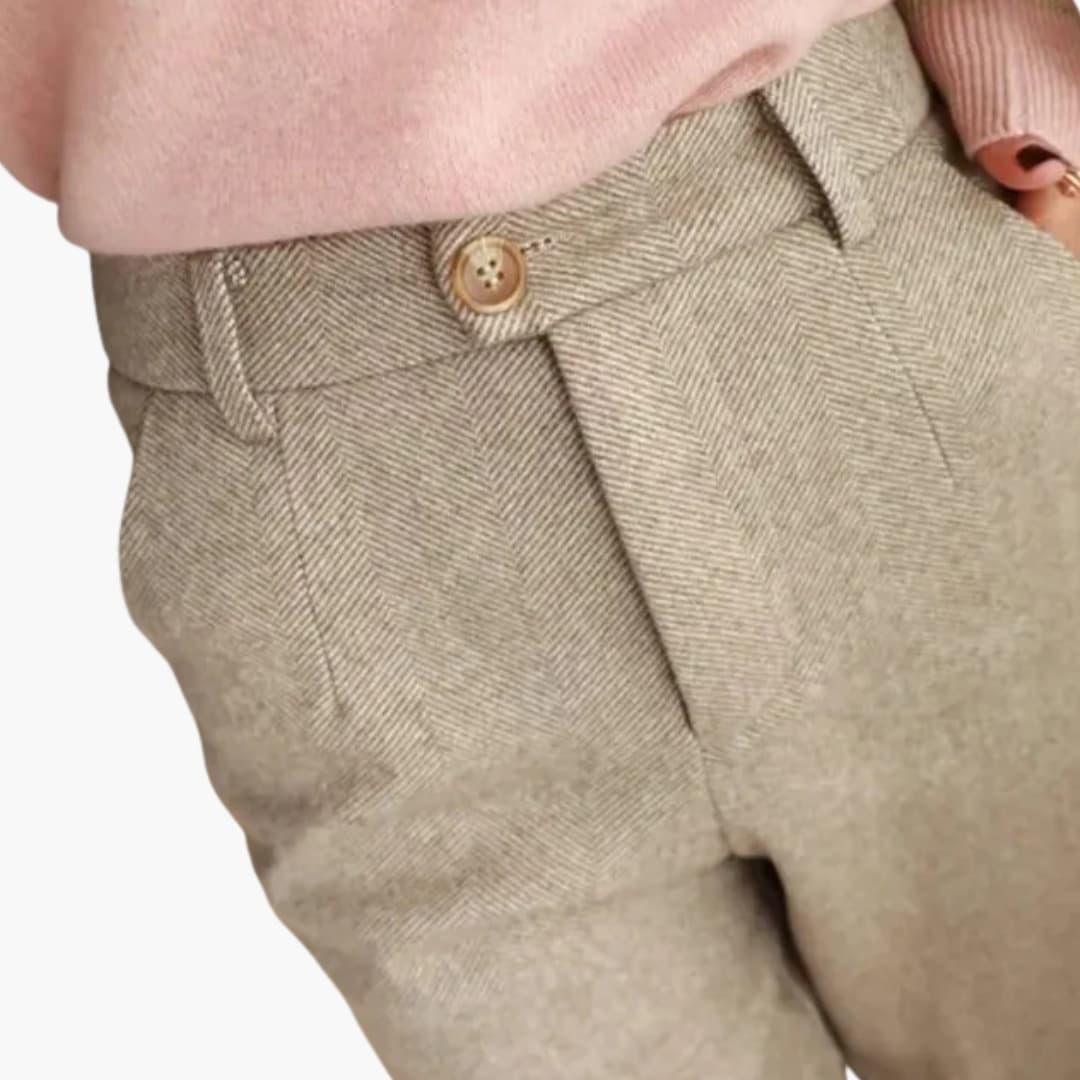 Women's straight-leg pants with elastic waist, side pockets, and button closure for everyday comfort
