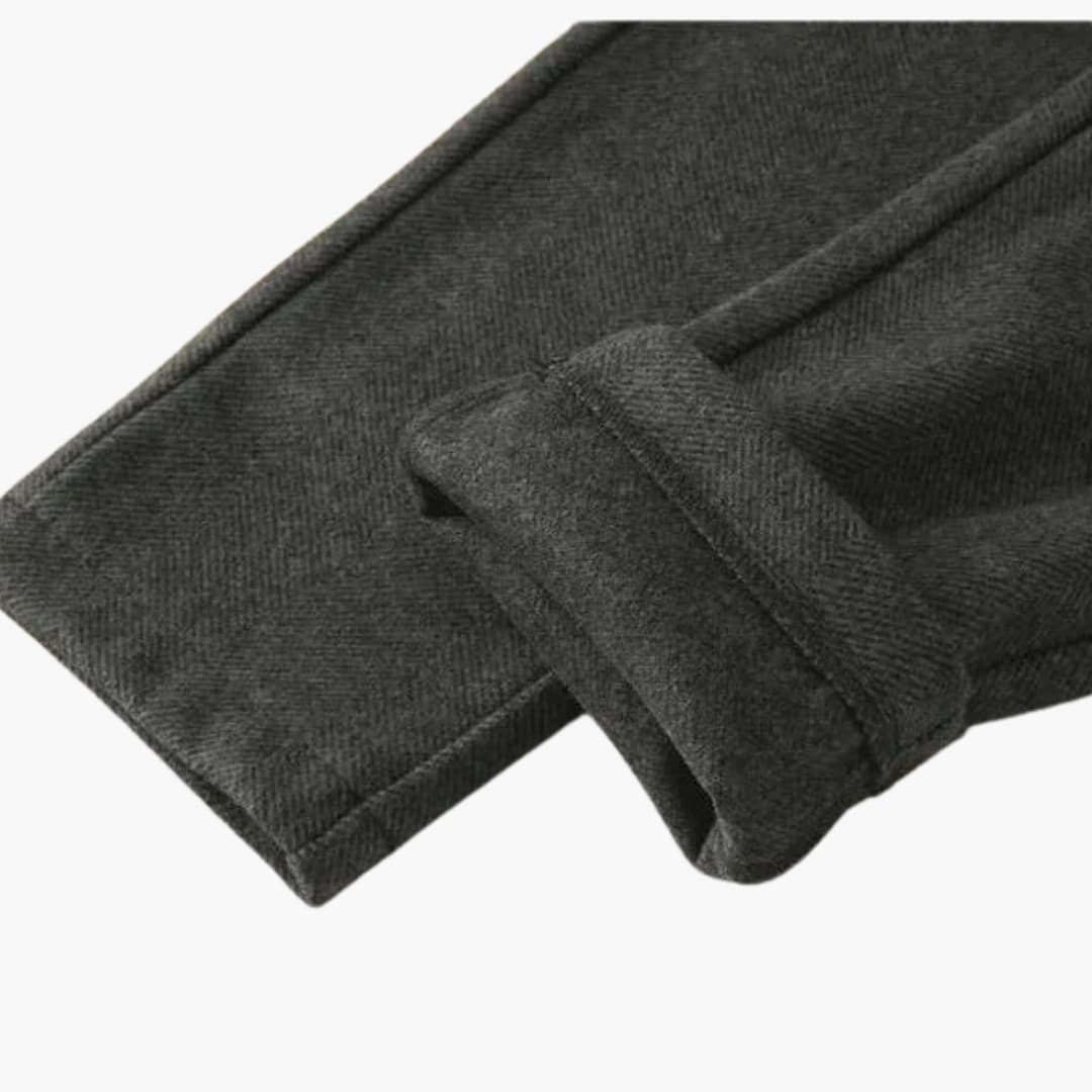 Women's straight-leg pants with elastic waist, side pockets, and button closure for everyday comfort