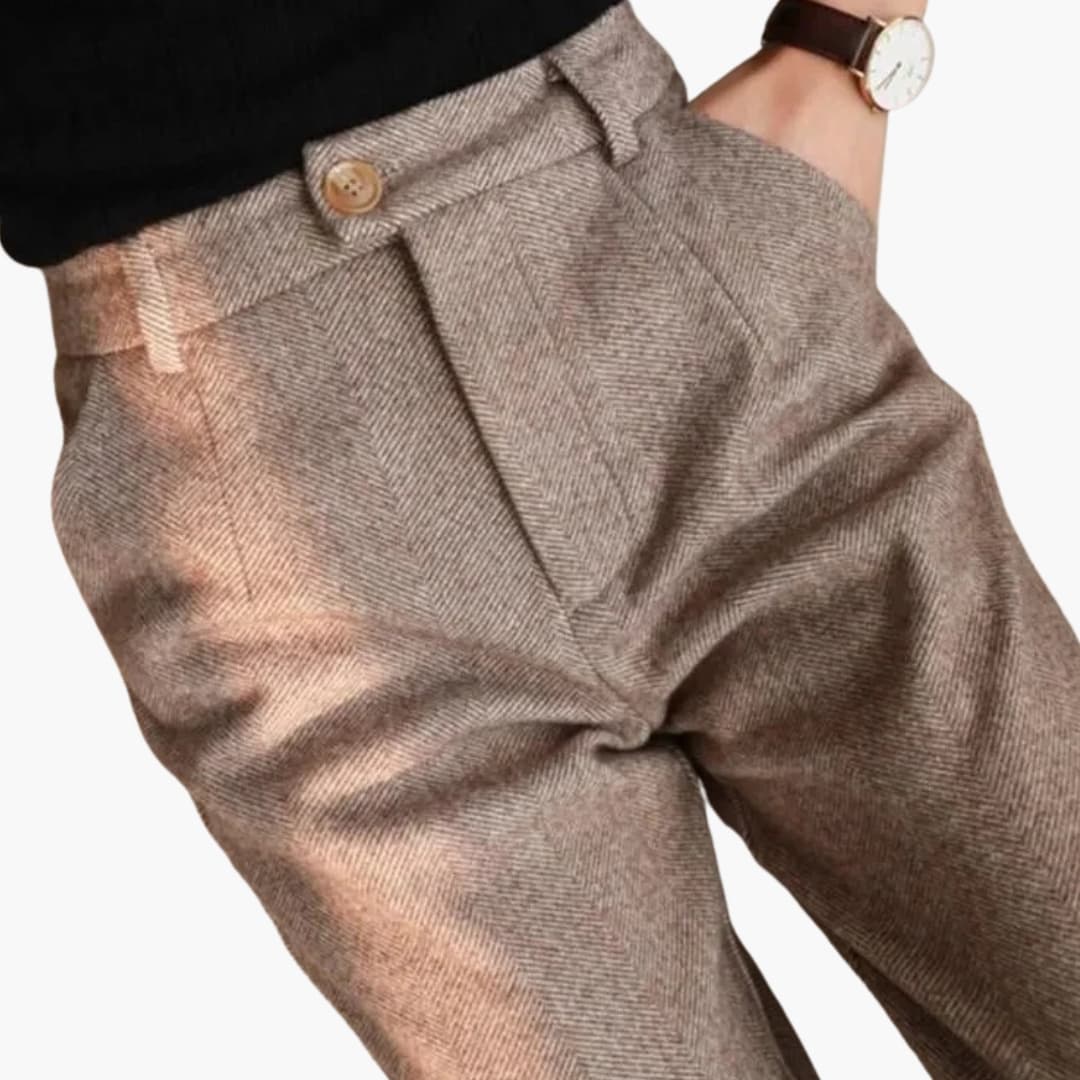 Women's straight-leg pants with elastic waist, side pockets, and button closure for everyday comfort