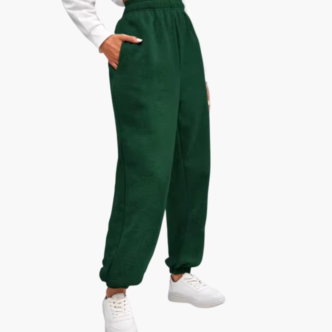 Women's high-waisted tapered leg pants with elastic waist, side pockets, polished everyday style
