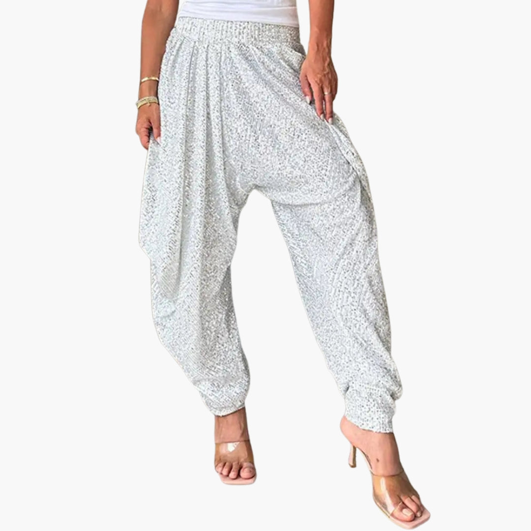 Women's glittered high-waisted wide-leg pants with draped ankles, silver glam evening style