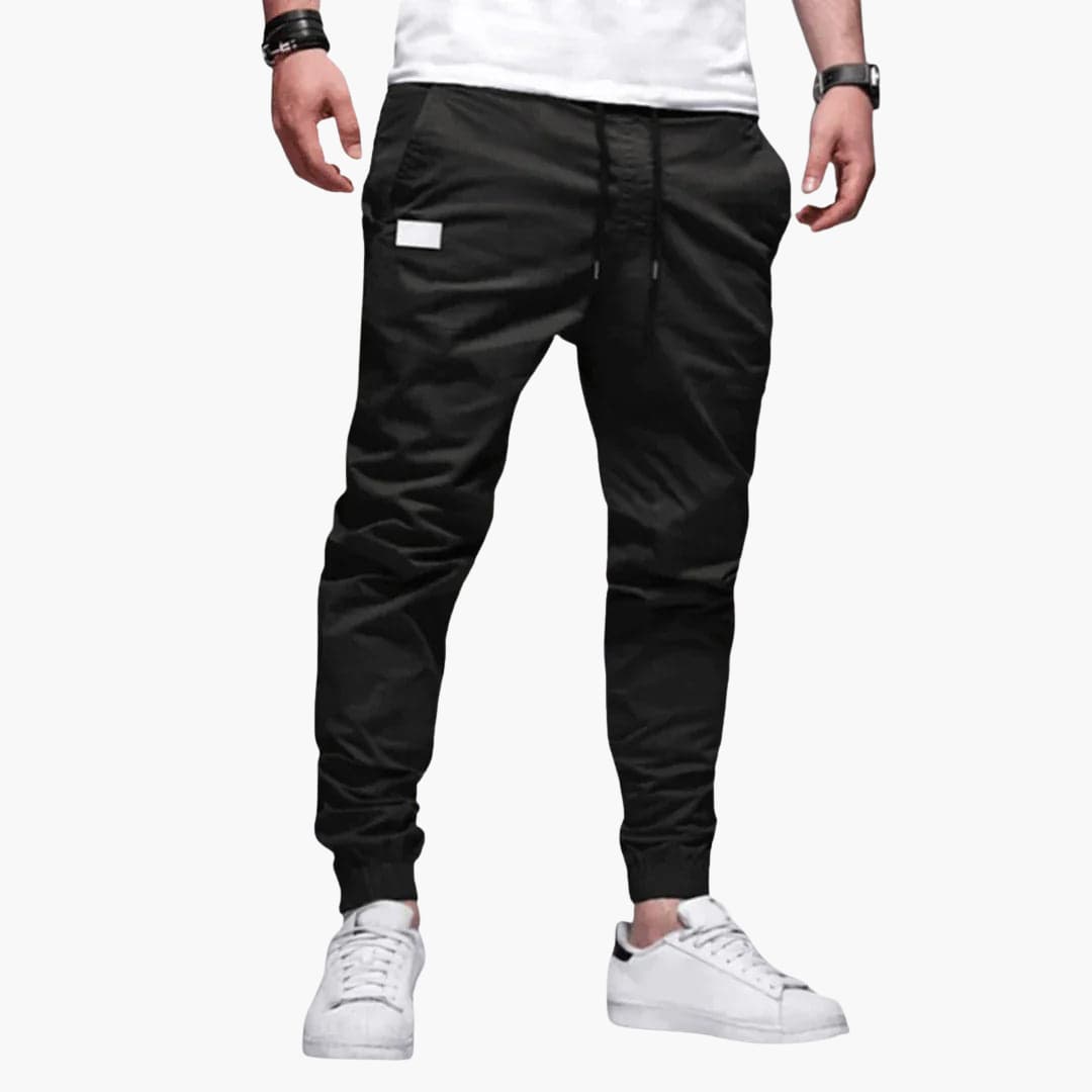 Men's tapered drawstring pants with elastic waistband in a straight-cut modern silhouette