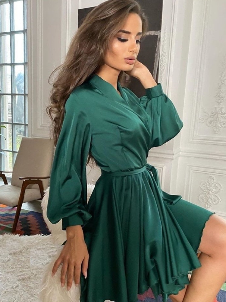 Champagne satin mini wrap dress with waist-defining belt, elegant cocktail silhouette for women
