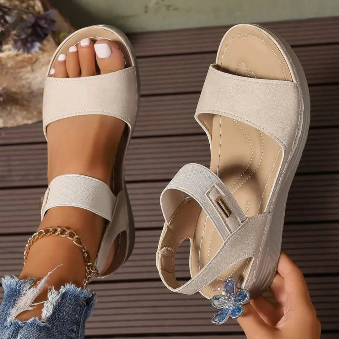 Pene women's open-toe platform sandals in neutral tones with wide straps and adjustable ankle strap