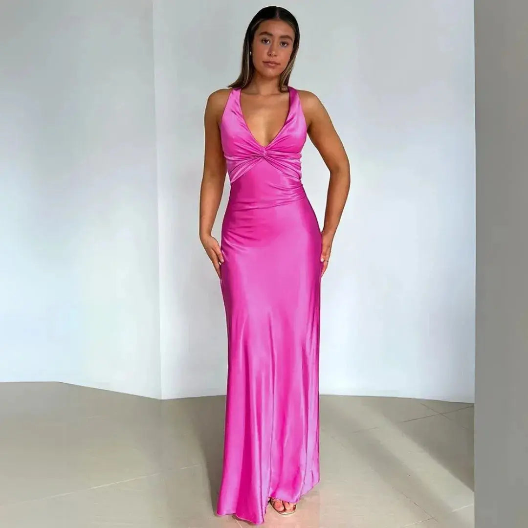 Ivory satin halter maxi dress with twist-front detail, body-hugging silhouette for formal events