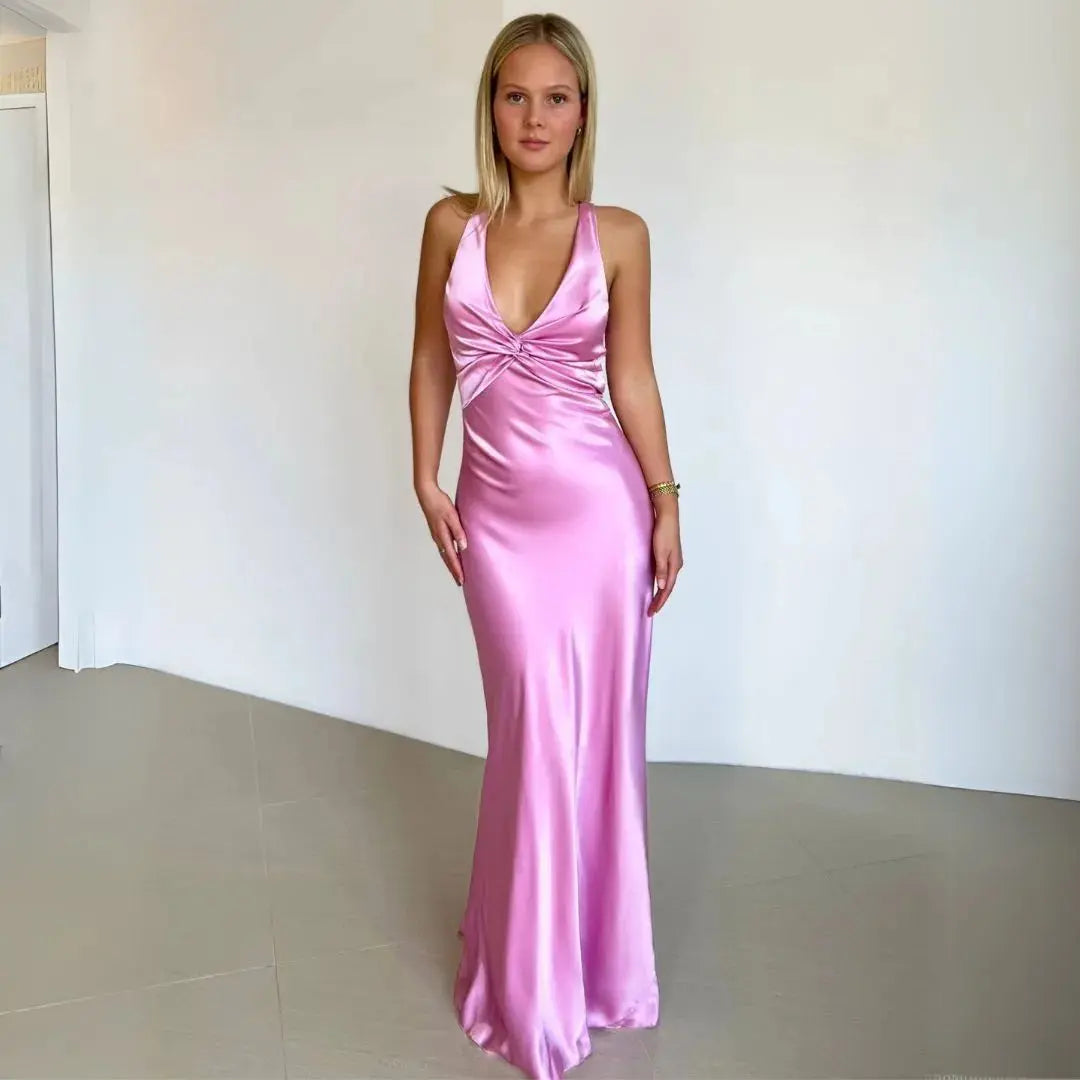 Ivory satin halter maxi dress with twist-front bodice, sleek body-hugging silhouette for formal events