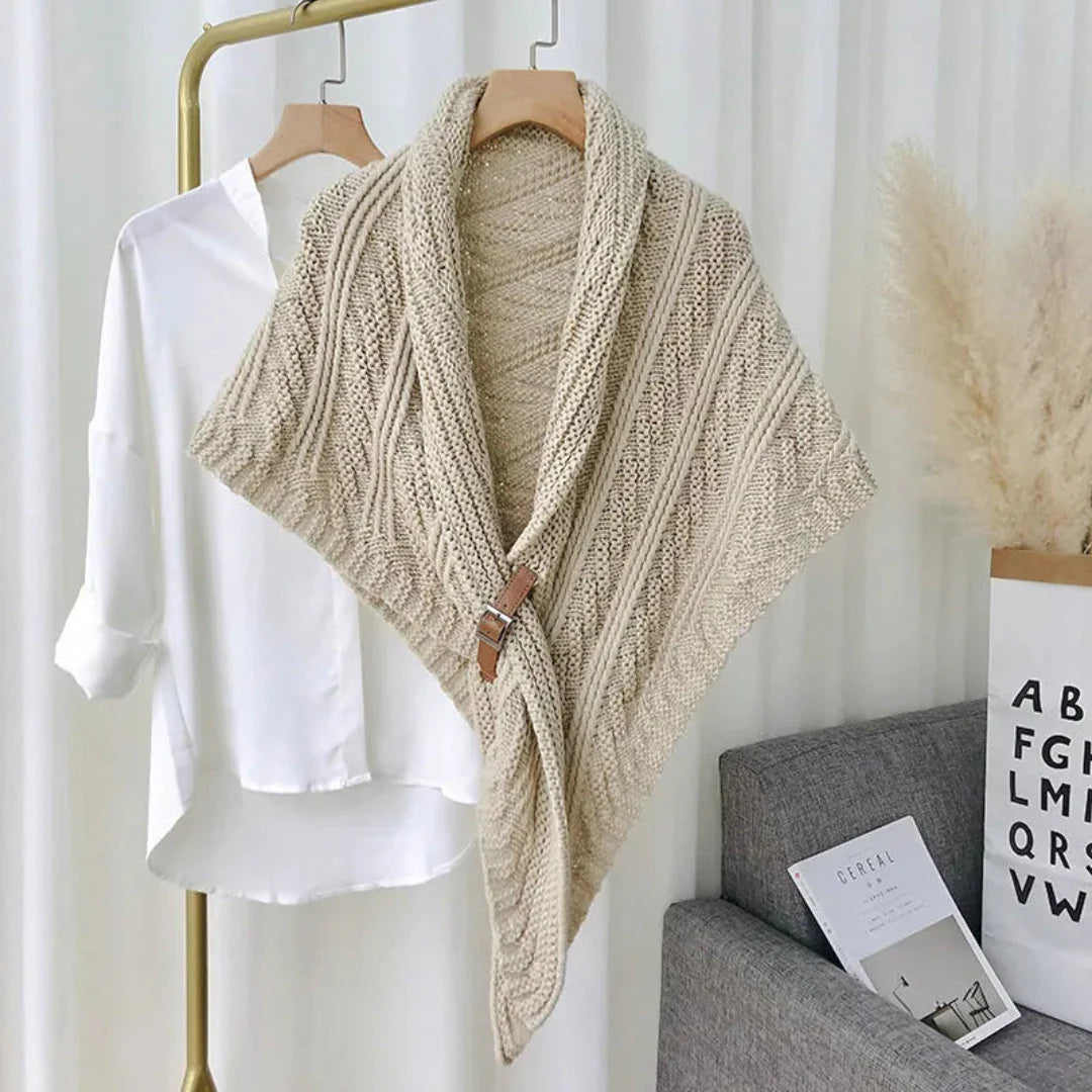 Women's cream cable knit shawl wrap with chunky texture and adjustable buckle closure
