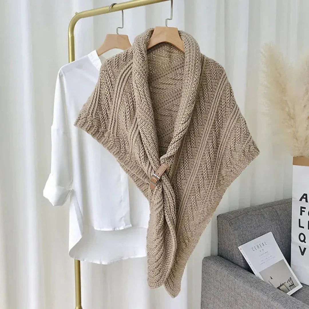 Women's cream cable knit shawl wrap with chunky texture and adjustable buckle closure