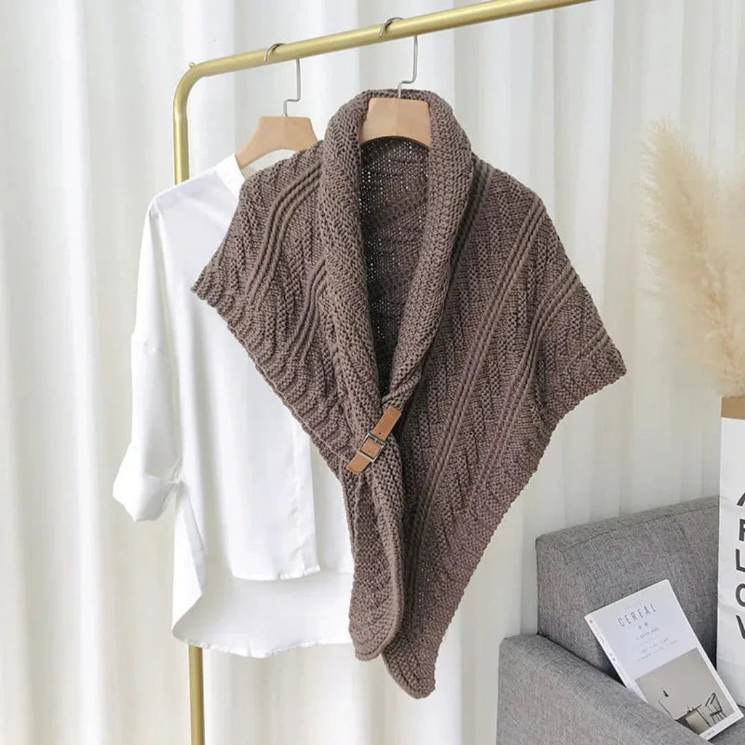 Women's cream cable knit shawl wrap with chunky texture and adjustable buckle closure